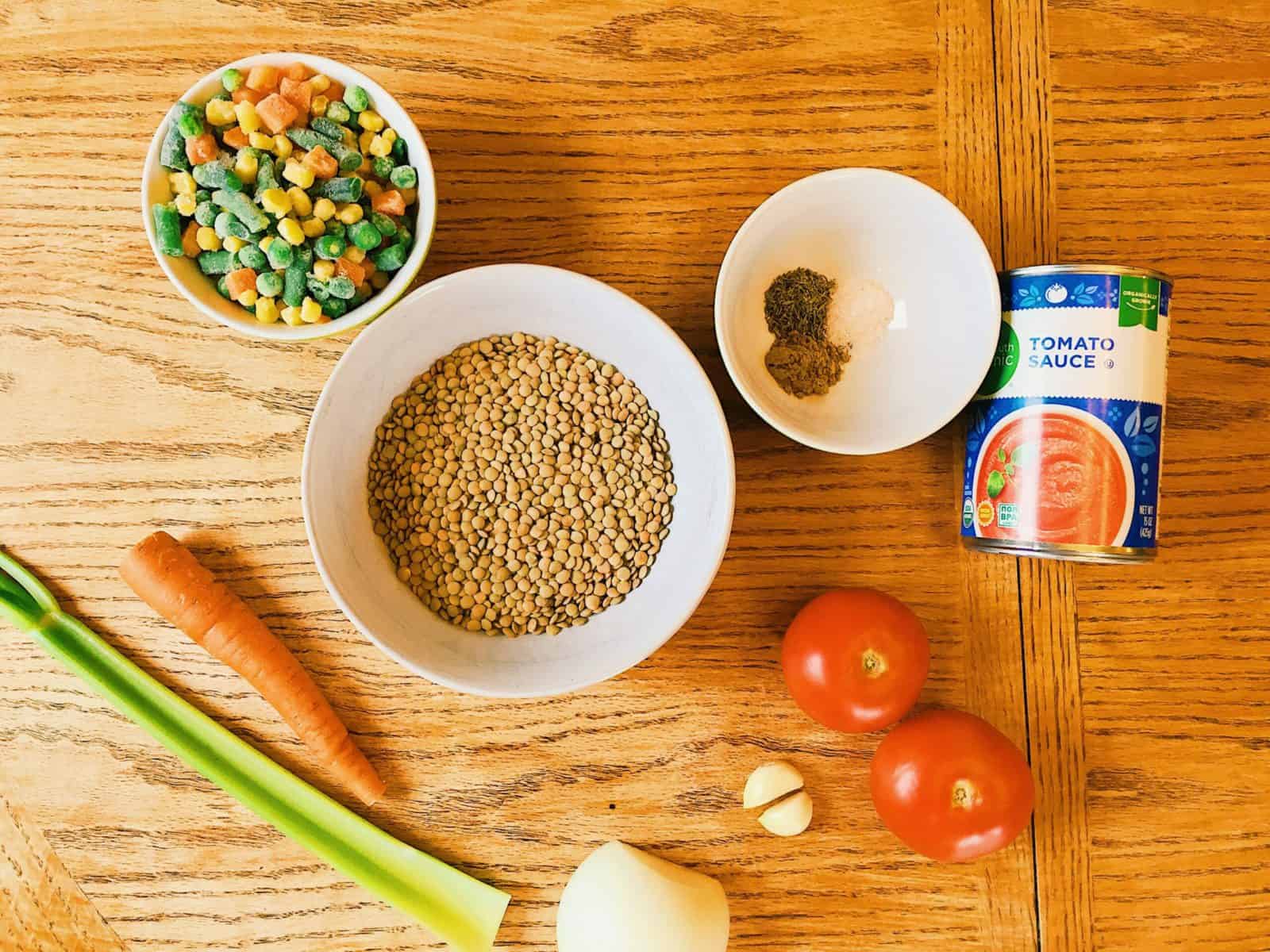 Ingredients for vegetable soup on a table.
