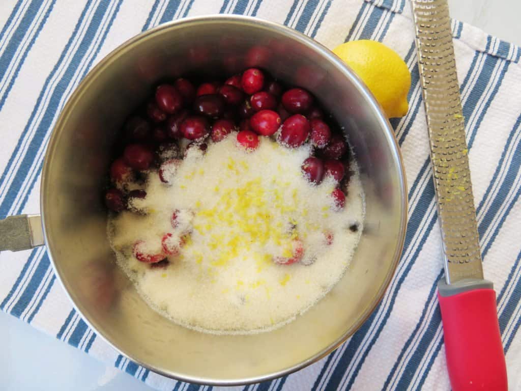 Cranberry sauce ingredients in a pot before its cooked.