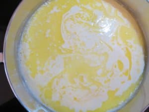 Cream with melted butter in a skillet.
