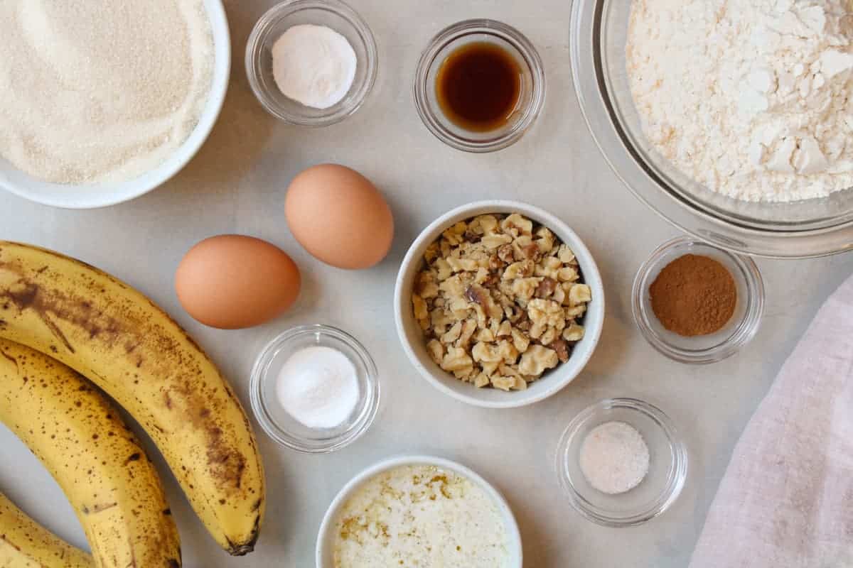 Banana nut bread ingredients on a table.