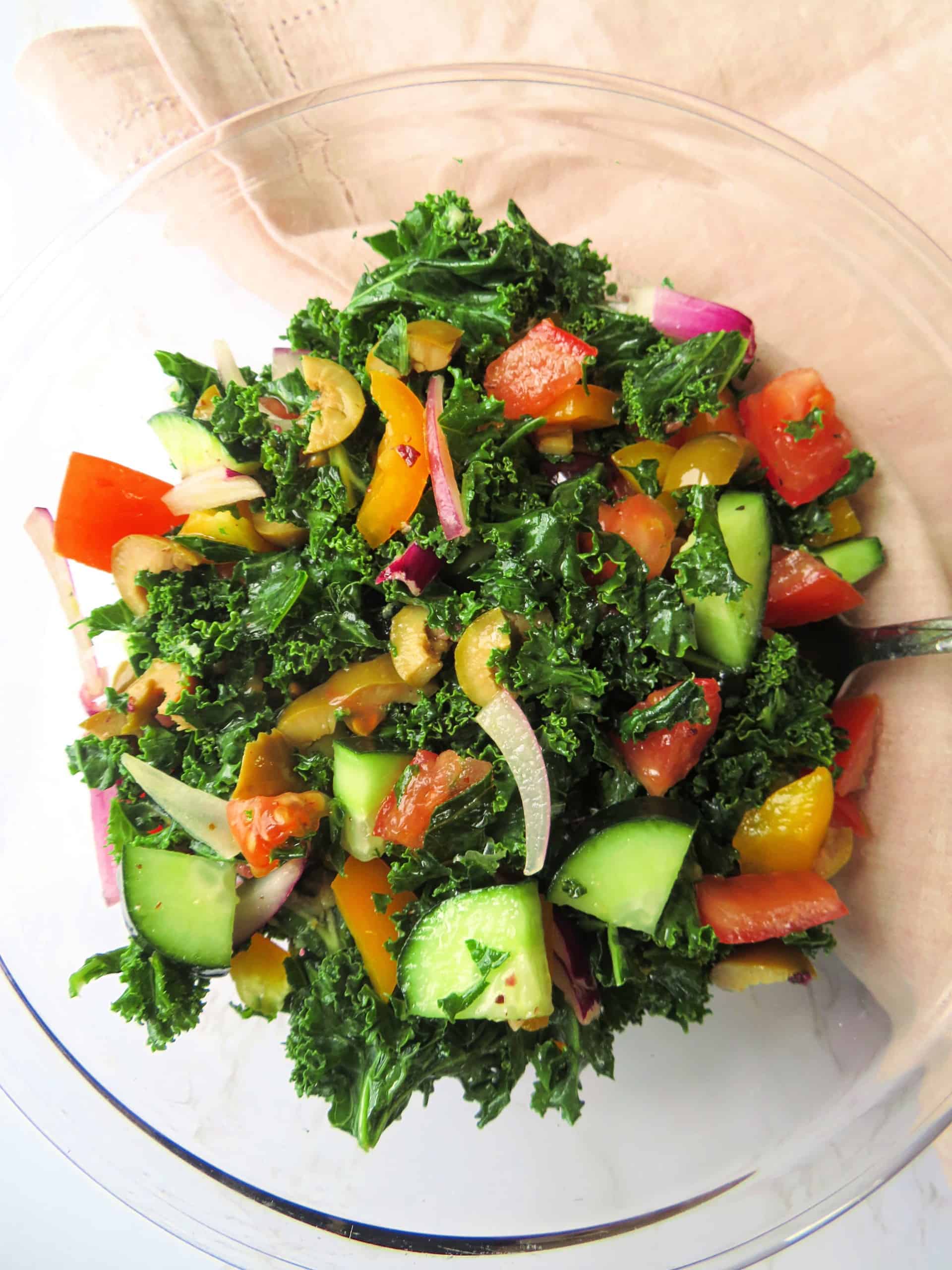 Top view of kale salad in a bowl.