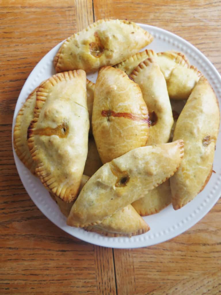 close up of meat pies on a table