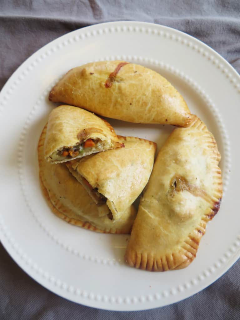 Close up on golden brown meat pies