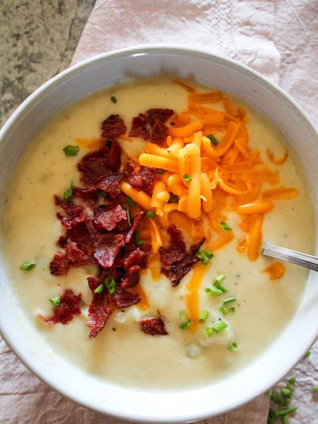 top view of potato soup in a bowl on a table