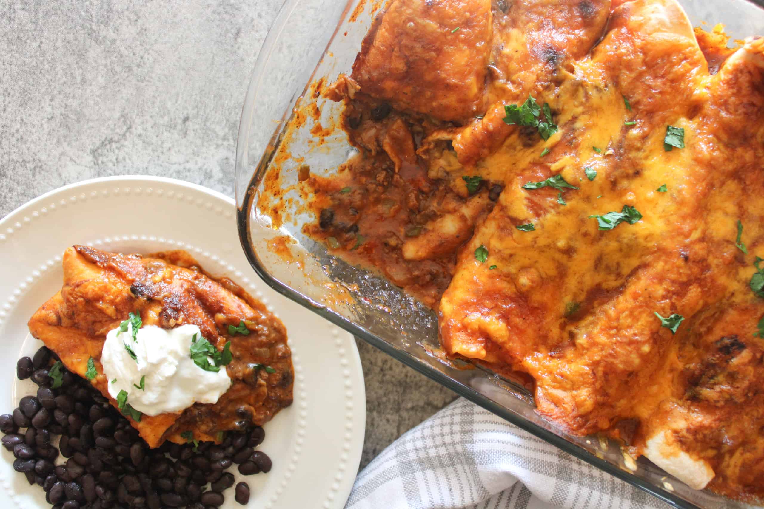 top view of enchiladas with black beans and red sauce from scratch