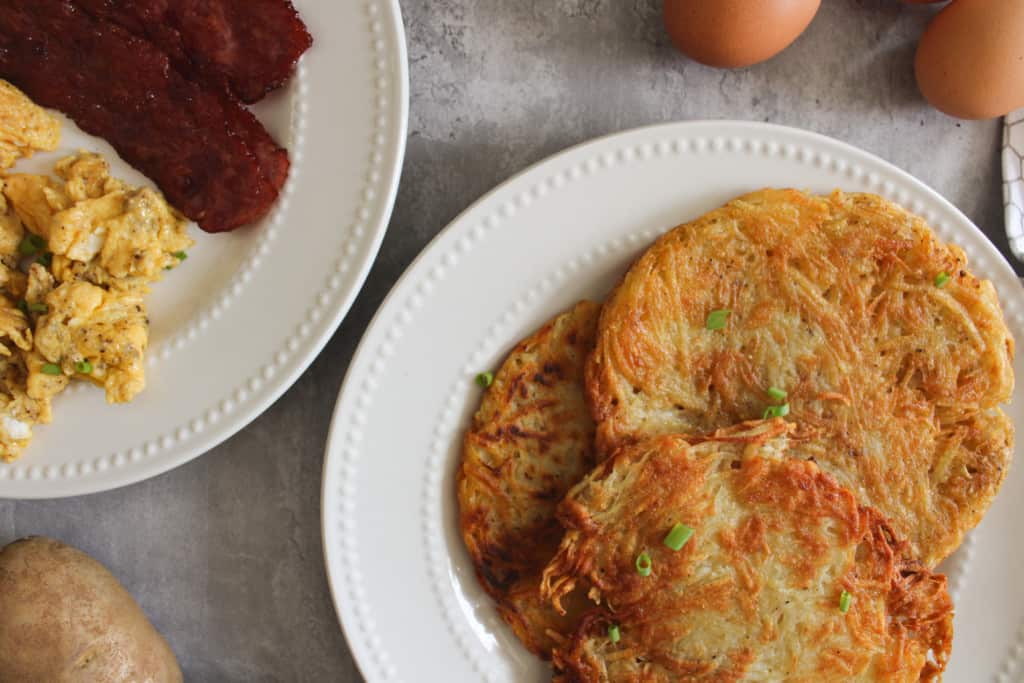 stack of hashbrowns on a plate