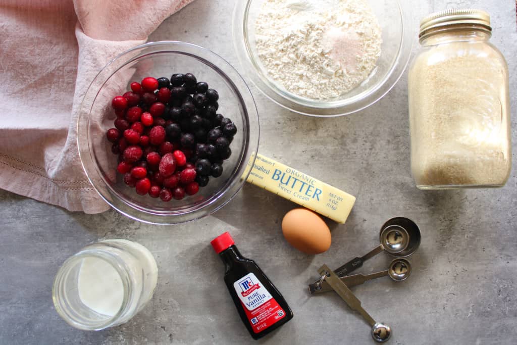 Over head shot of blueberry cranberry muffins ingredients on a table