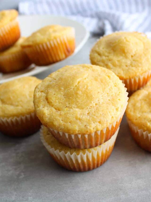 Stacked muffins on a counter