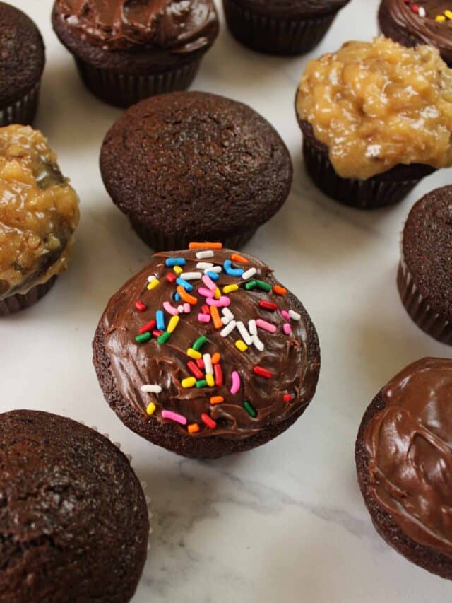 Close up on a frosted cupcake with sprinkles.