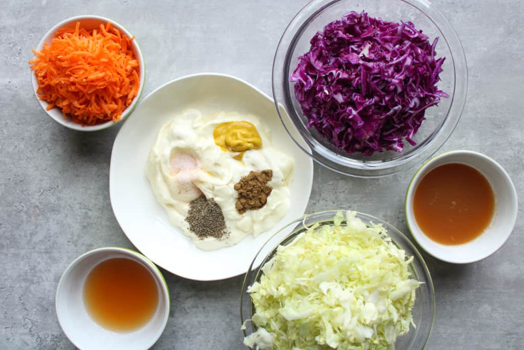 Traditional coleslaw recipe ingredients on a table. 
