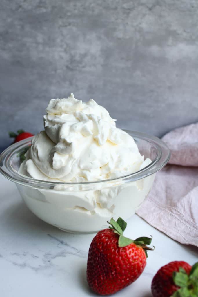 Whipped cream in a bowl. 