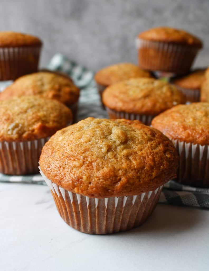 Close up on a breakfast banana muffin with nuts. 