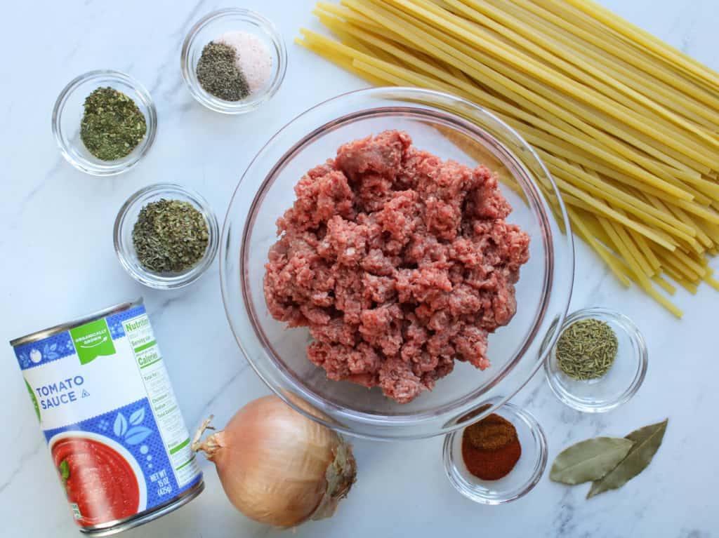 Bison bolognese recipe ingredients on a table. 