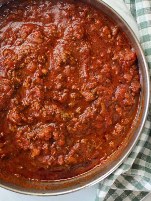bison bolognese in a skillet on a table.