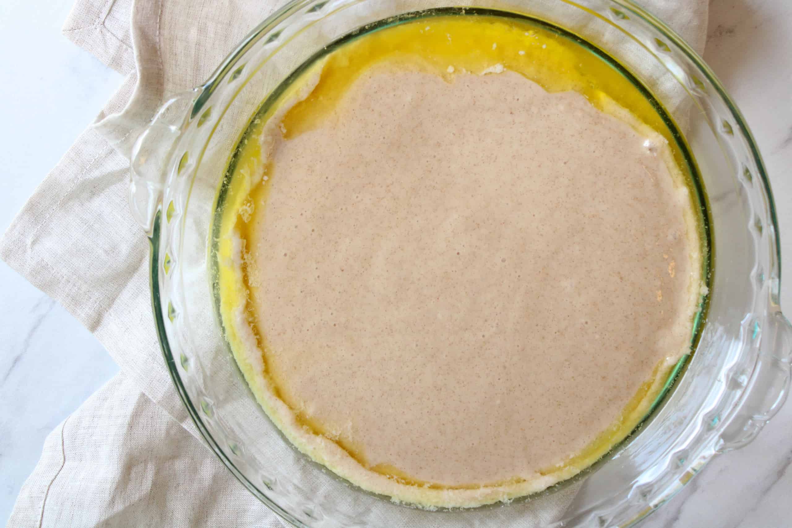 Uncooked cobbler topping in a baking dish.