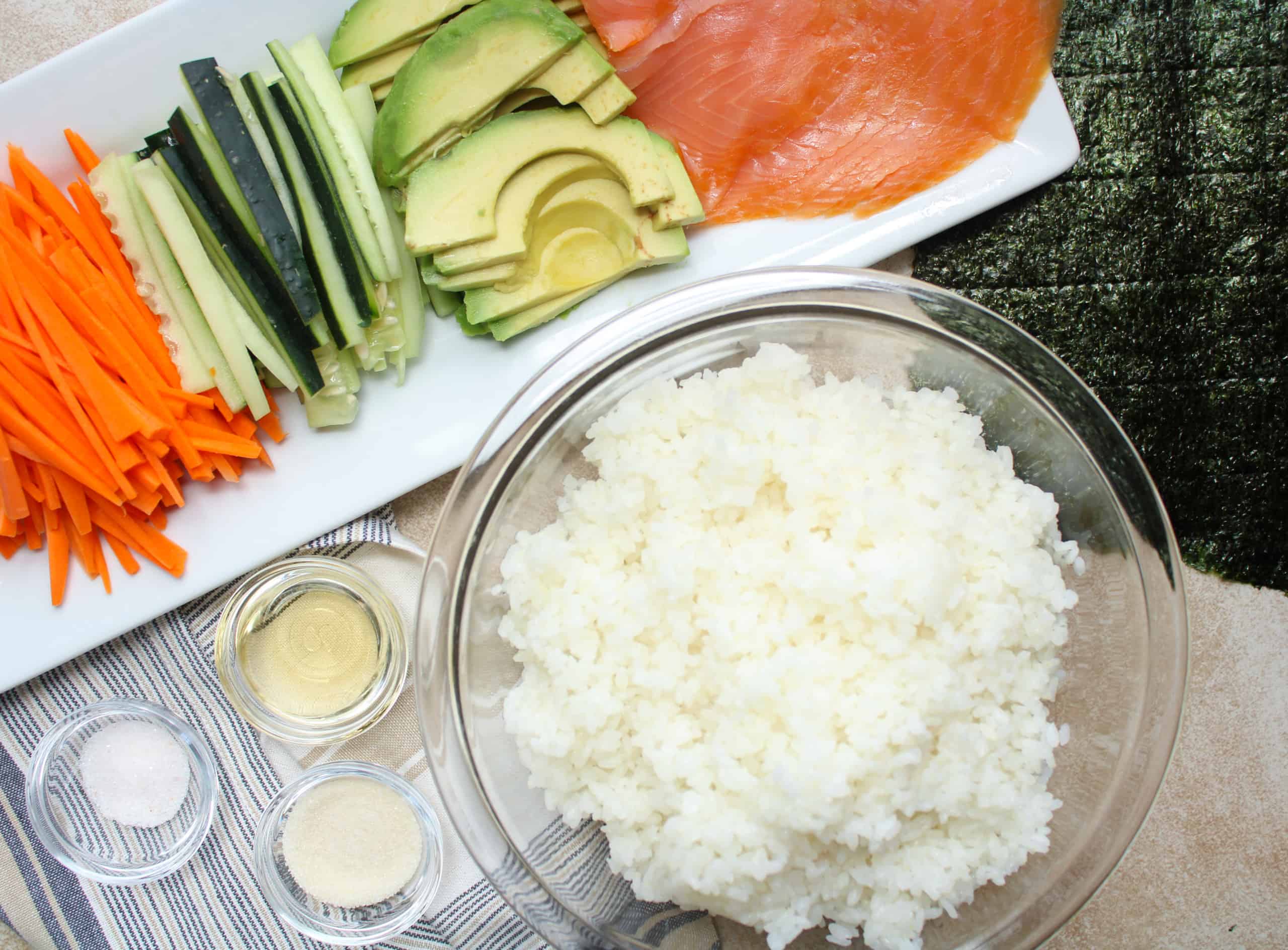 Overhead image of sushi roll ingredients on a counter.