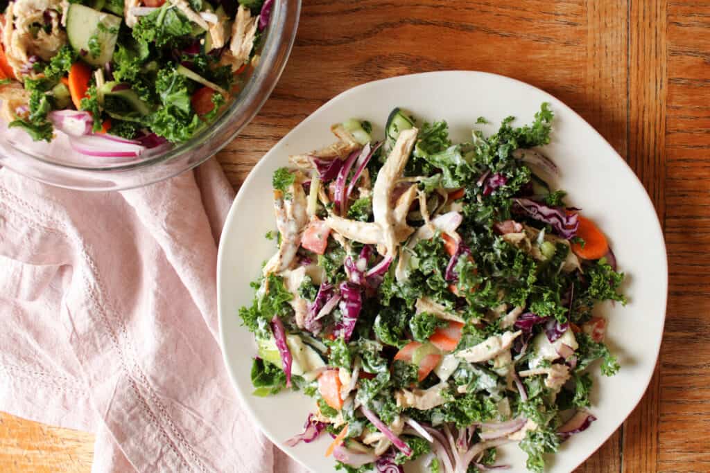 Kale chicken salad with creamy salad dressing. 