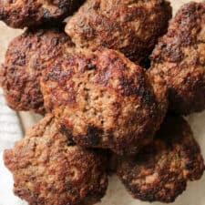 Close up on beef sausage patties.