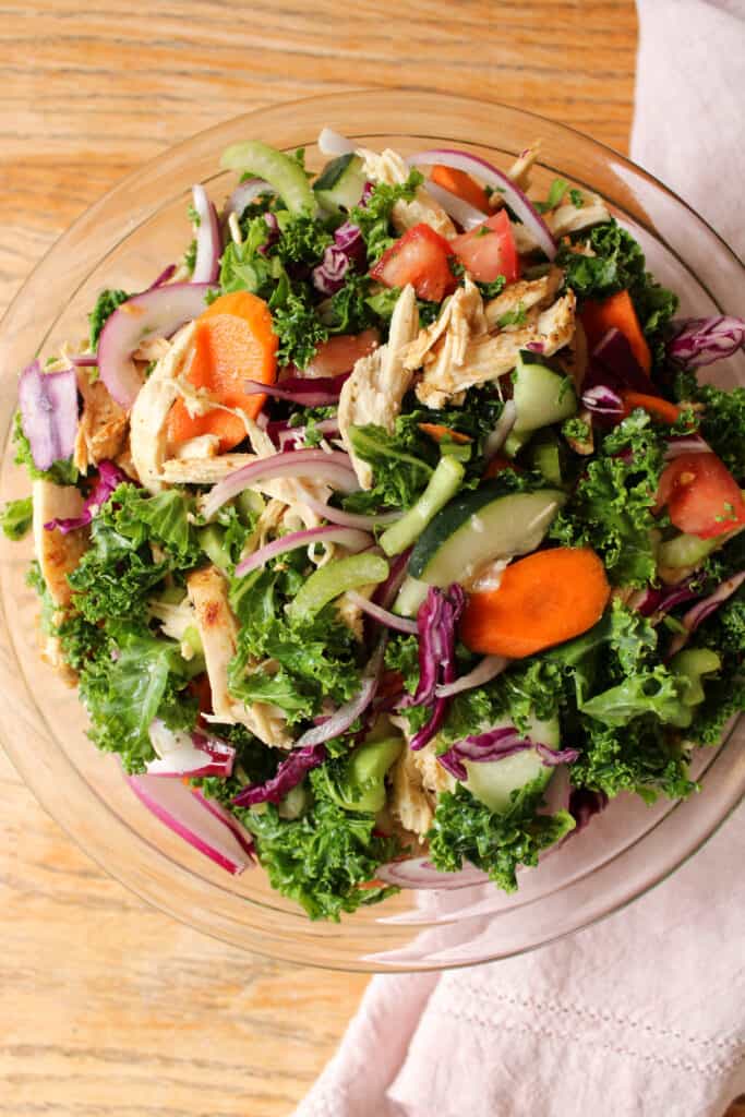 Kale chicken salad in a large bowl. 