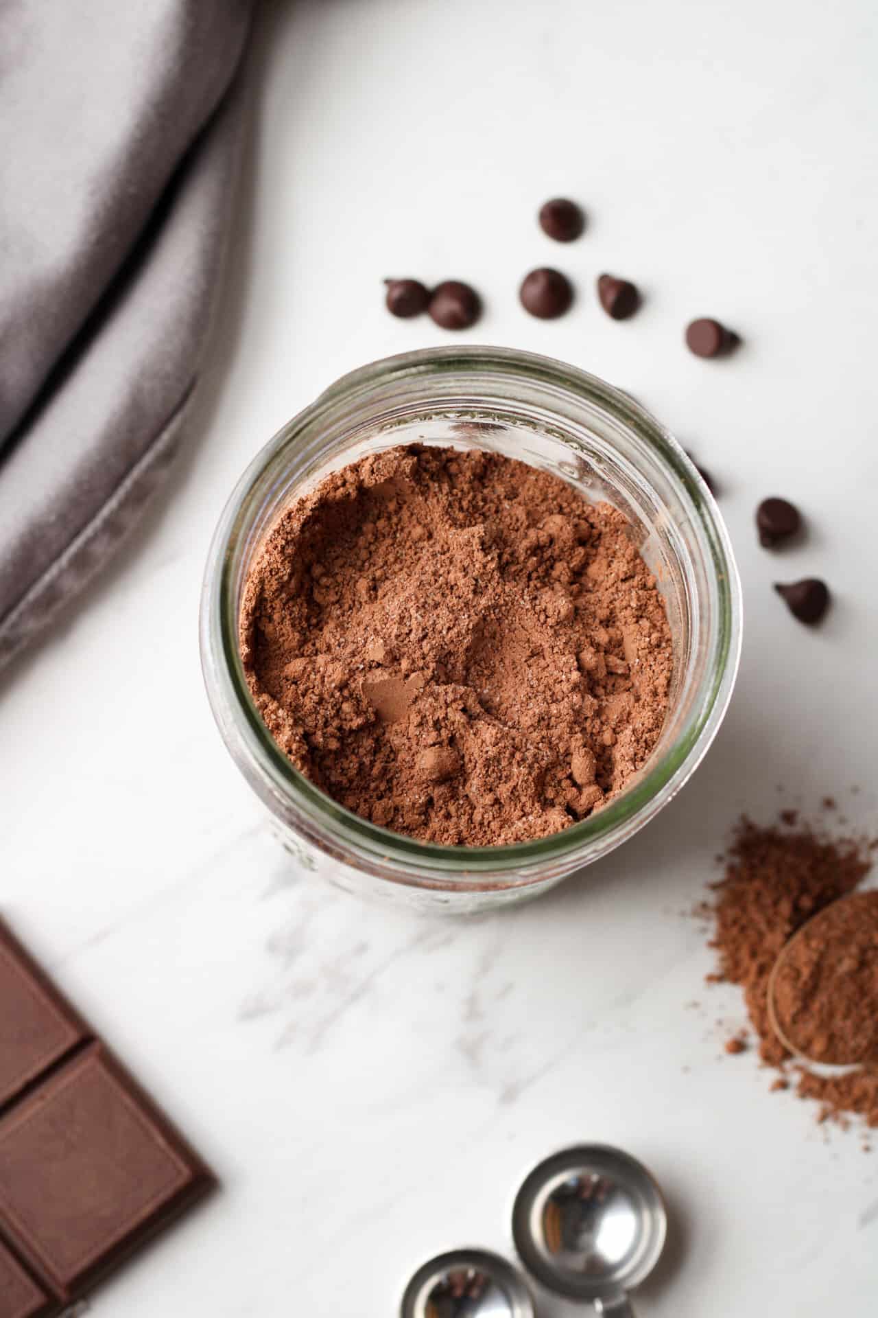 Close up on diy hot chocolate mix recipe in mason jar.