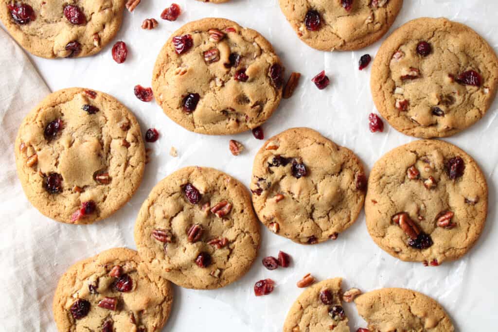 Cranberry pecan cookies with brown butter on a table.