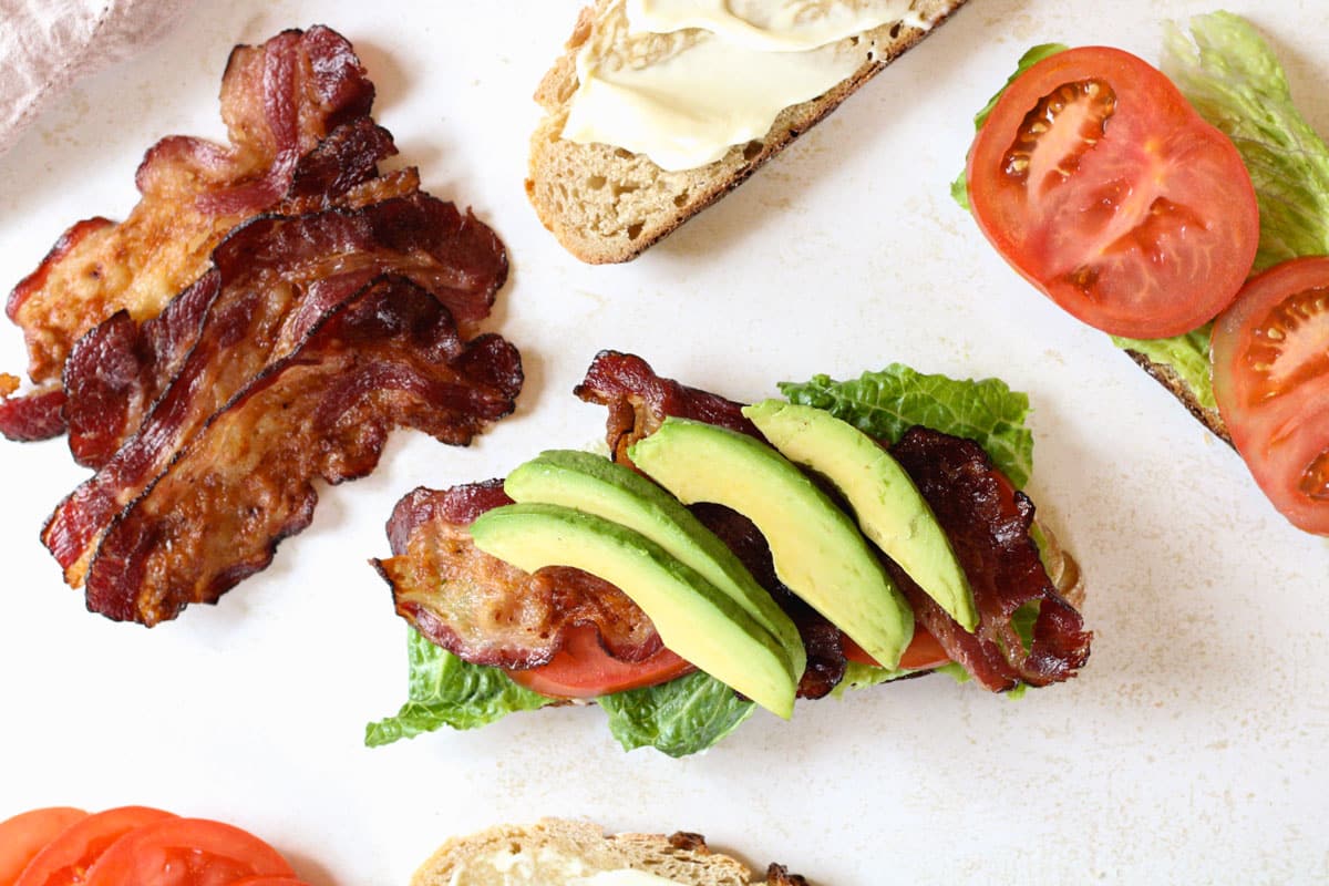 Overhead image of a open face blt sandwich.