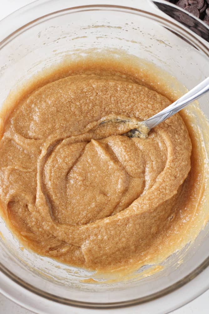 Close up of butter, sugar, and egg mixture for cookie dough.