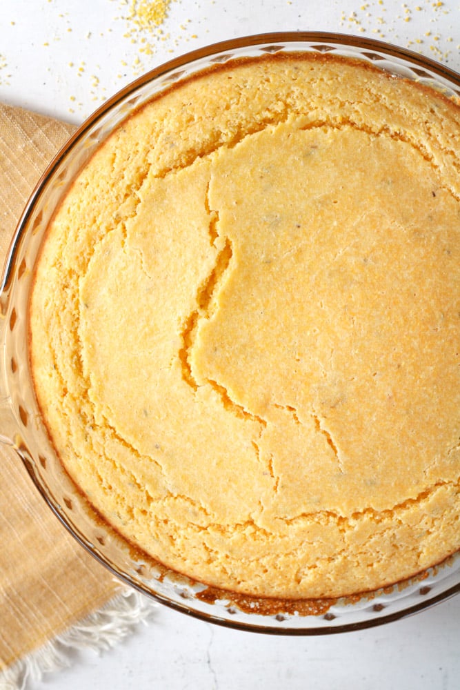Overhead image of polenta cornbread in a pan.