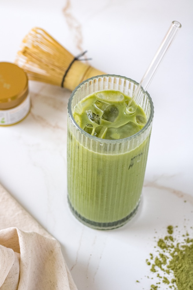 3/4 image of iced matcha in a glass.