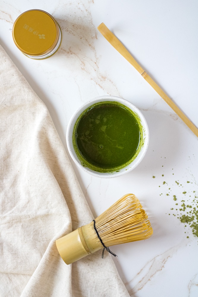 Matcha paste in a small bowl.
