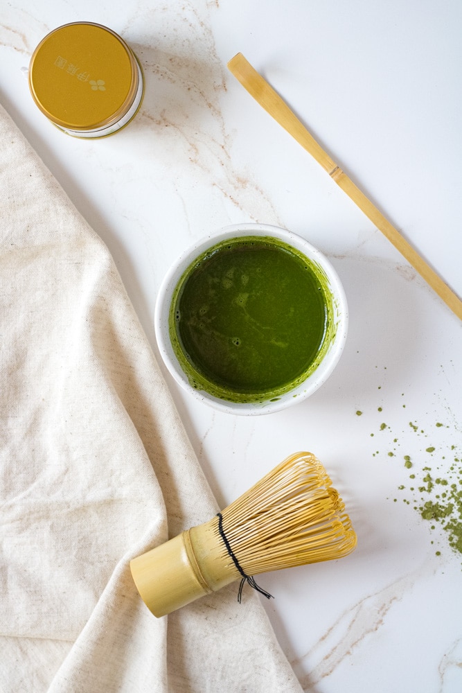 Matcha paste in a small bowl.