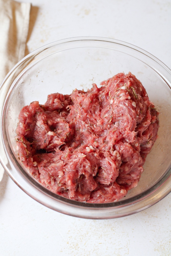 Mixed lamb burger mixture in a bowl.