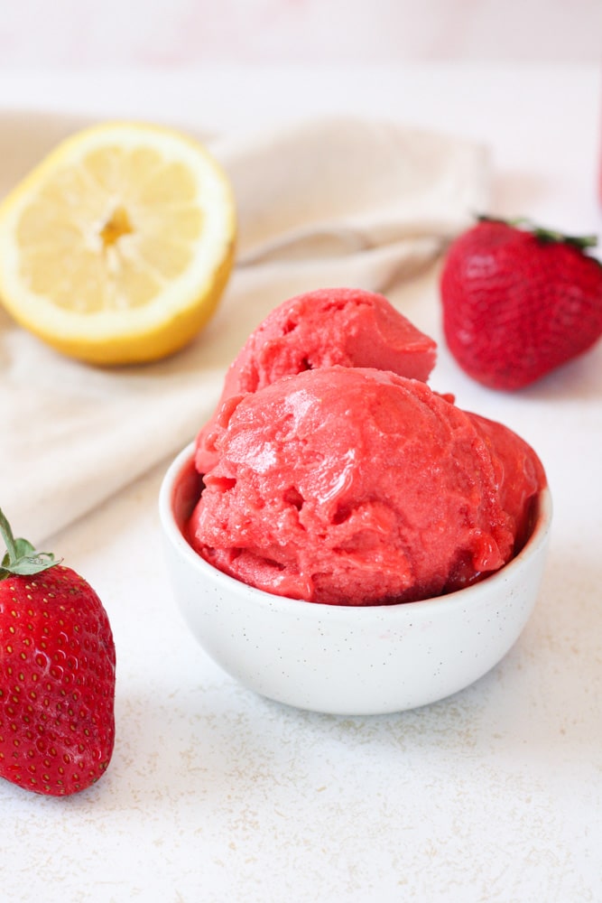 Close up image of strawberry sorbet in a bowl.