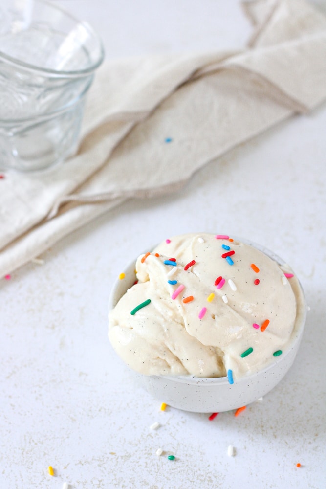Ninja creami vanilla ice cream in a bowl with sprinkles.