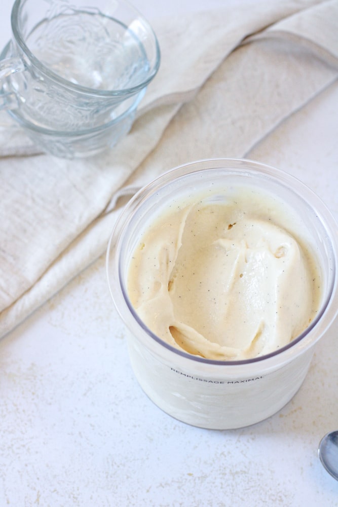 Creamy ninja creami vanilla ice cream in a pint container.