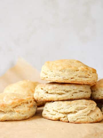 Close up stack of buttermilk biscuits.