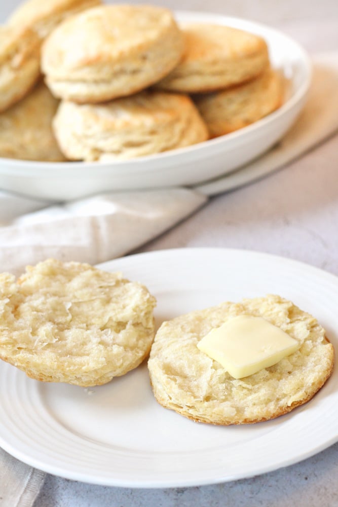 Sliced biscuit with butter.