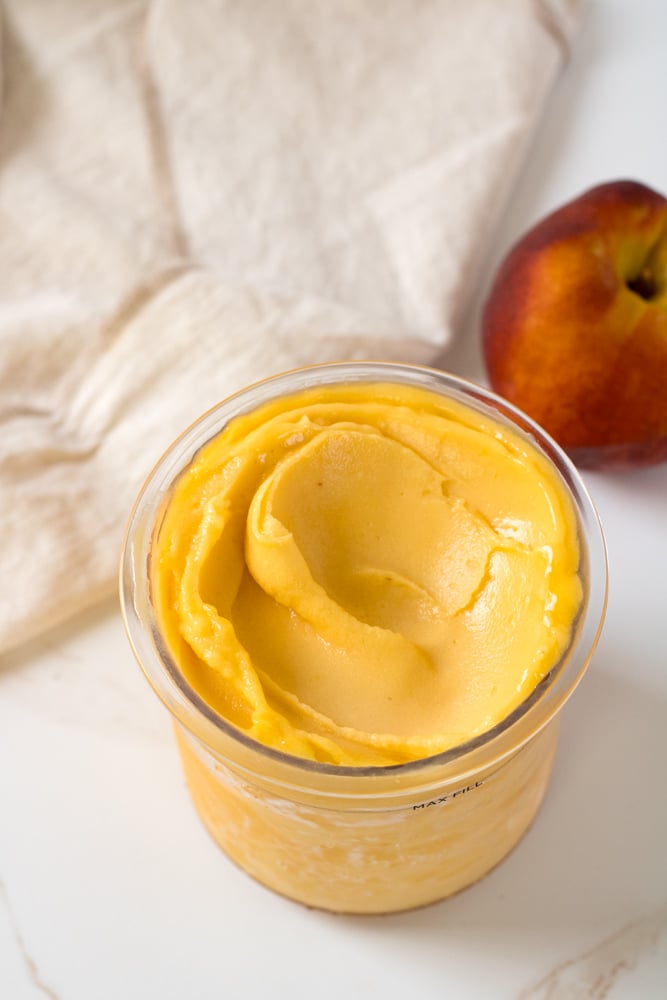 Close up image of creamy sorbet in a container.