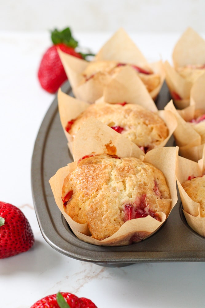 Side view of a muffin in a muffin pan.