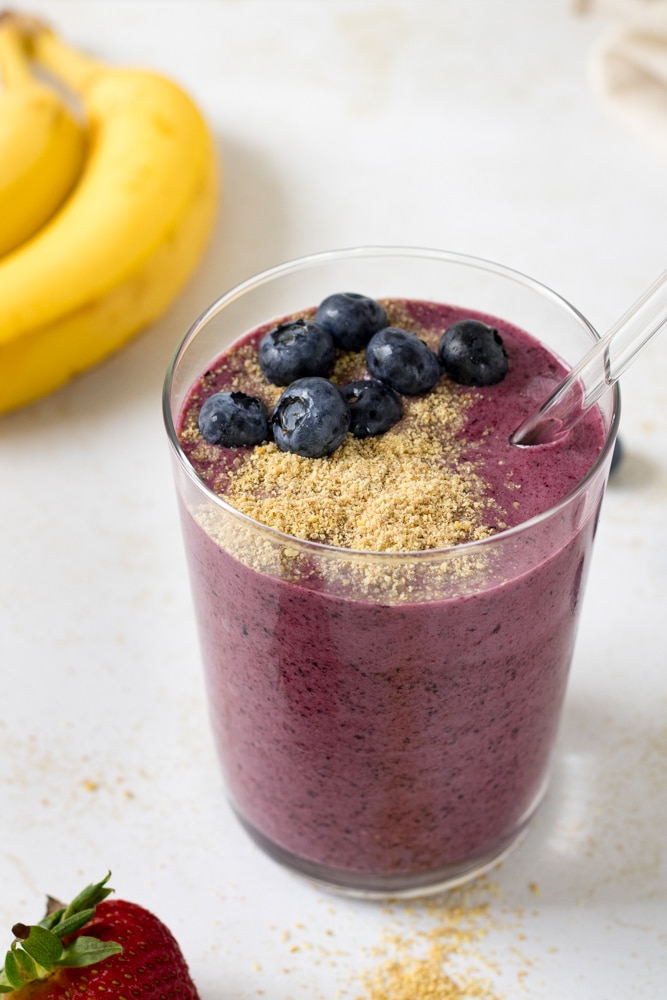 Side view of blueberry banana smoothie.