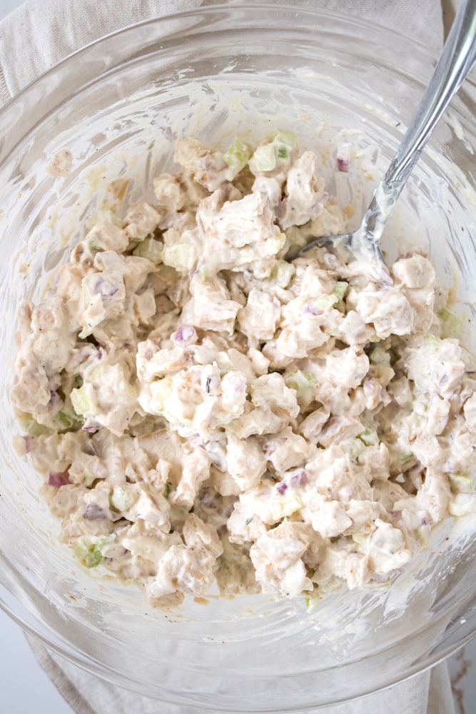 Close up image of smoked chicken salad in a bowl.
