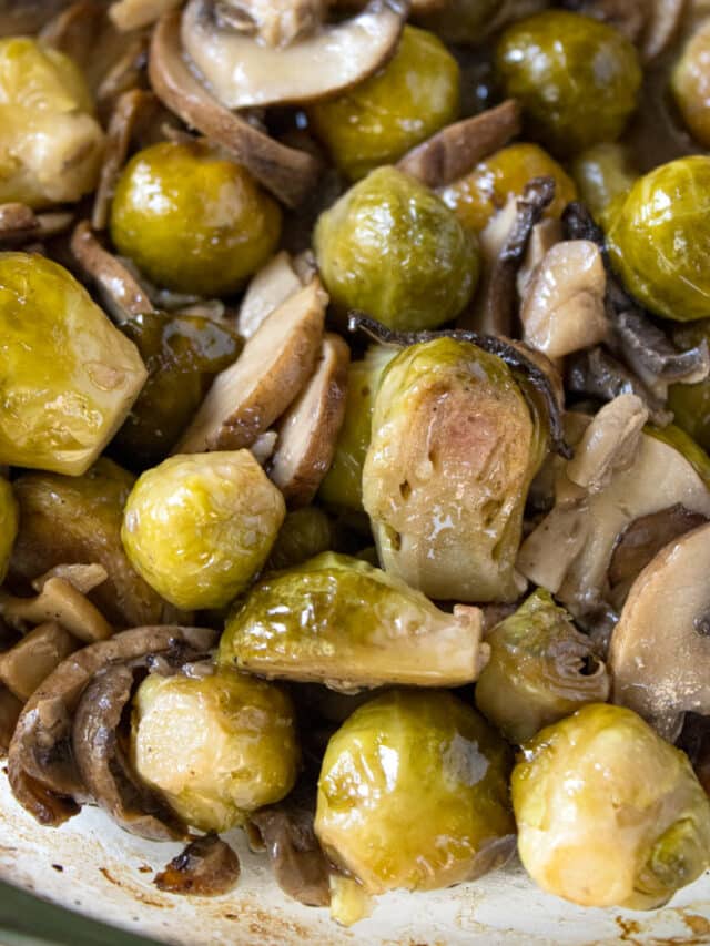Close up image of brussels sprouts in a baking dish.