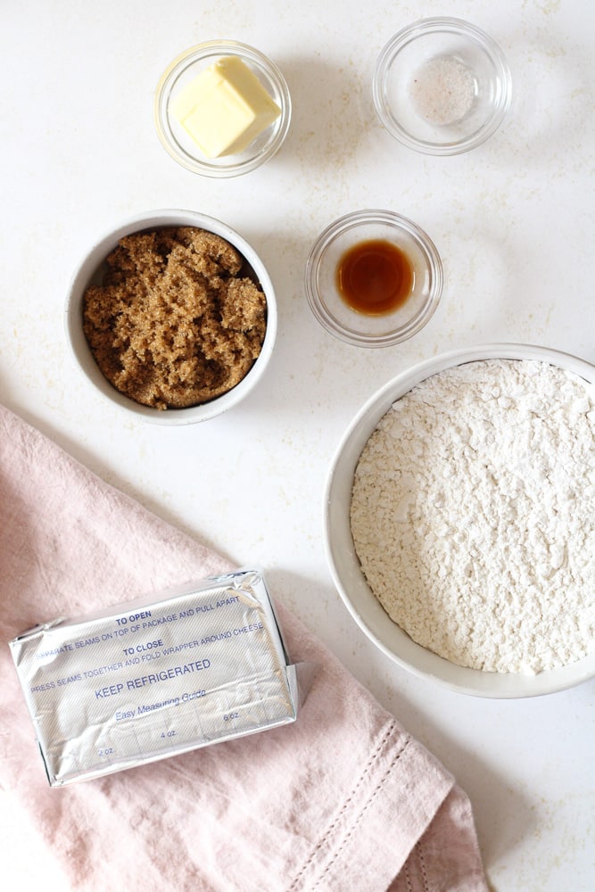 Cream cheese frosting ingredients on a table.