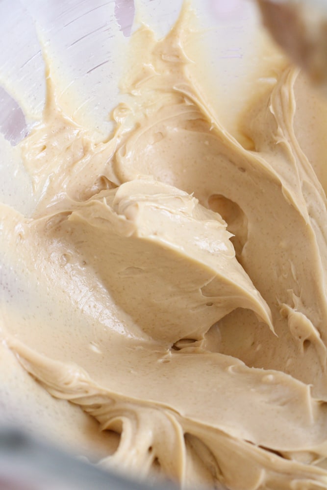 Close up of brown sugar cream cheese frosting in a bowl.