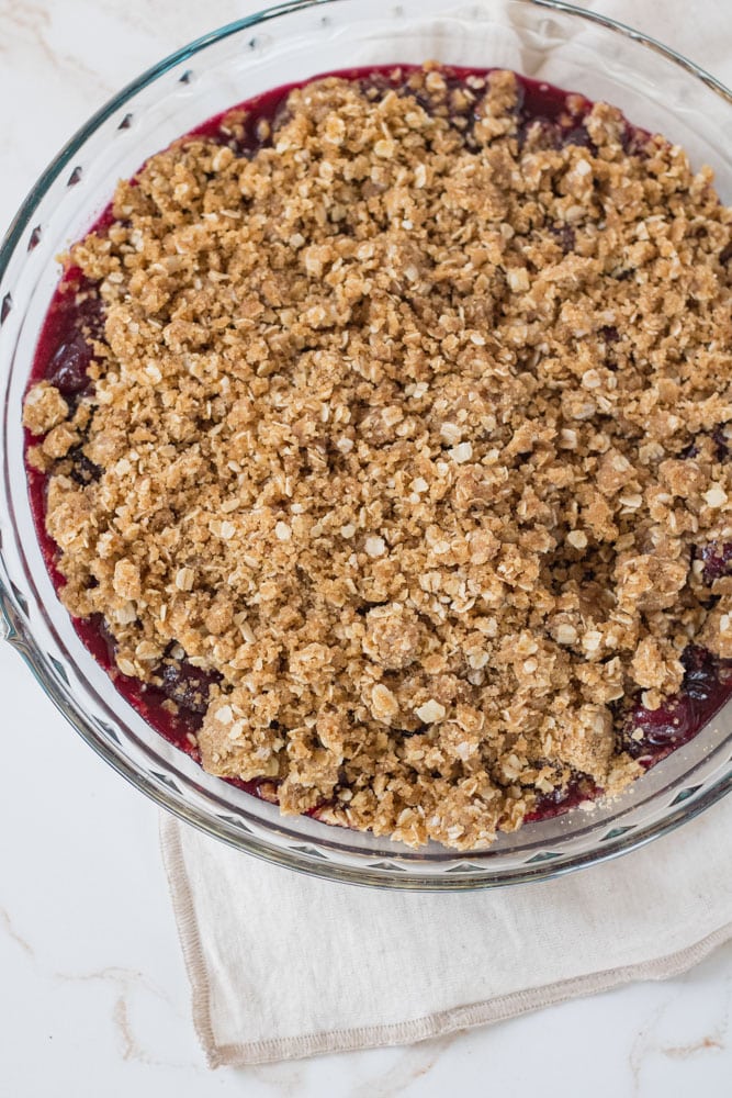 Cherry pie filing topped with oat brown sugar crumble.