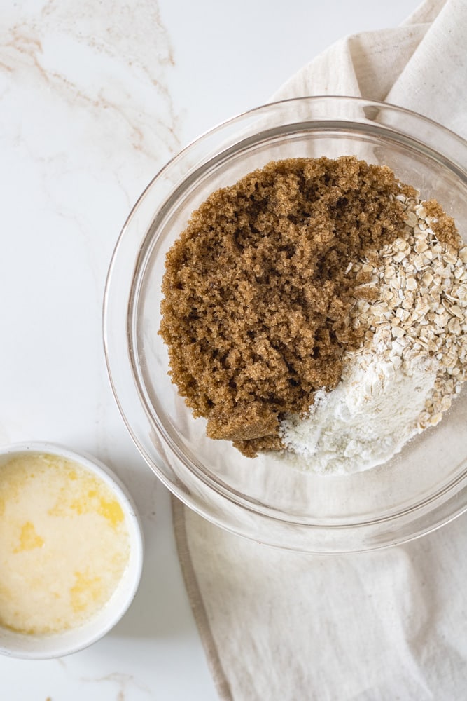 Brown sugar oat topping ingredients in a bowl.