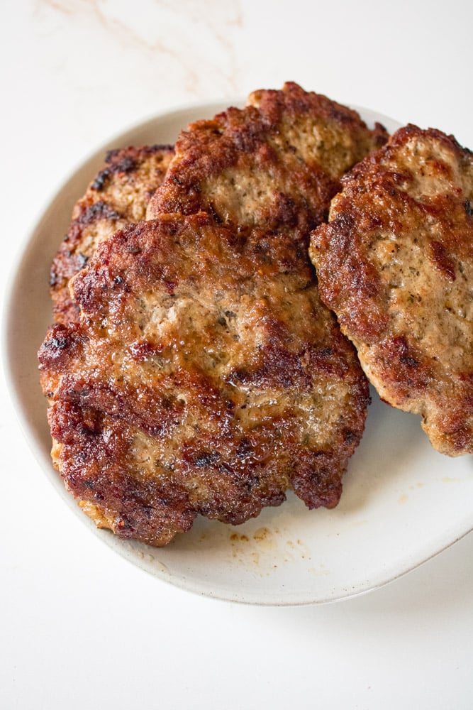 Turkey Sausage patties on a plate.