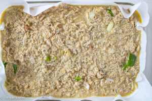 Overhead image of unbaked dish in a baking dish.