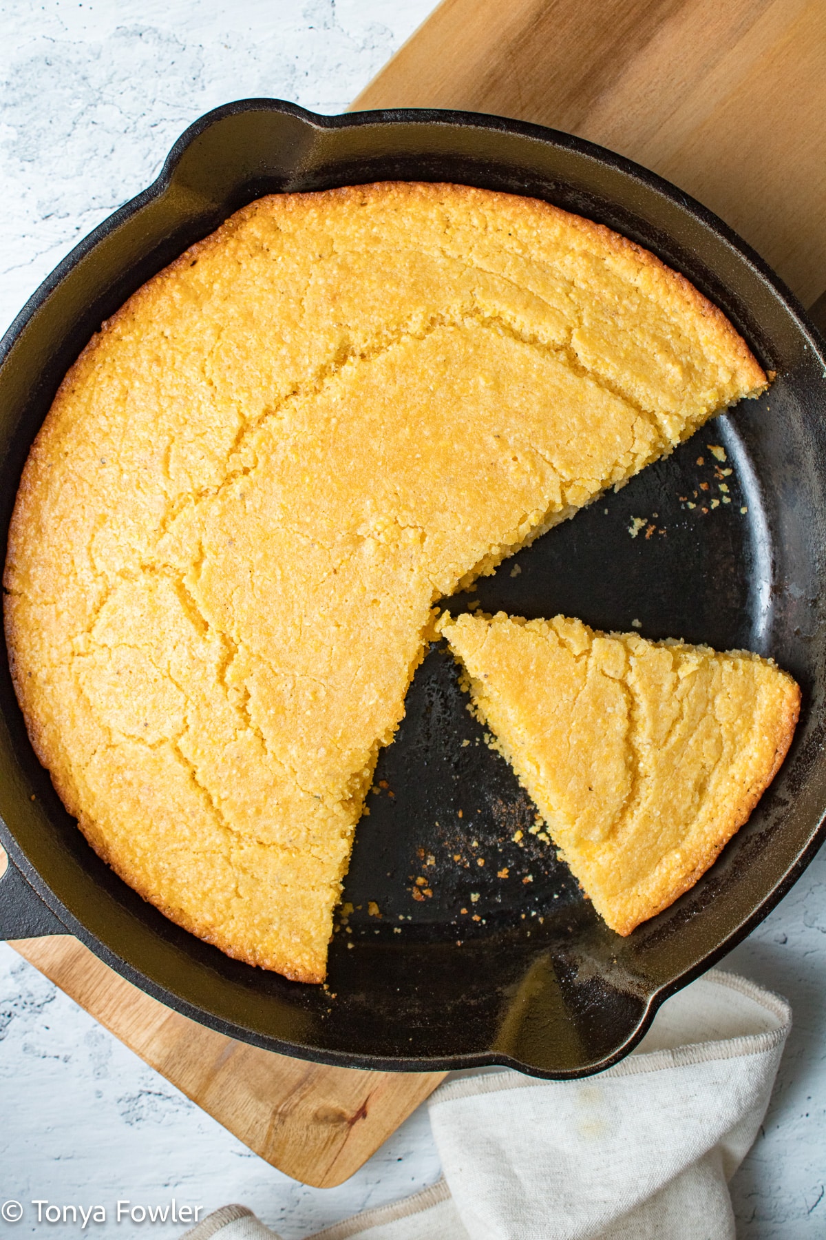 Cornbread in a cast iron skillet.