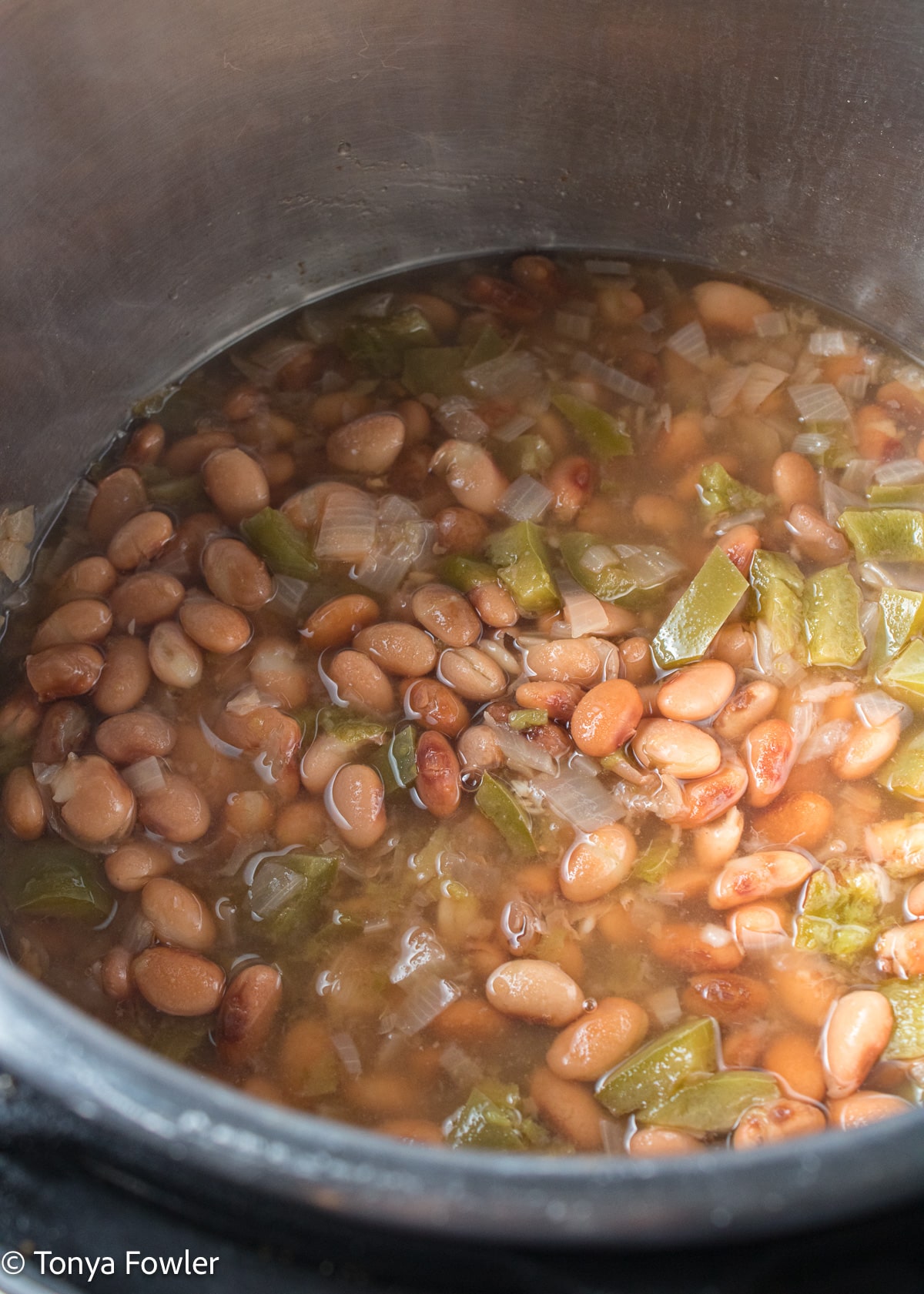 Cooked beans in a pot.